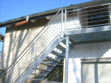 Treppe mit Edelstahlgeländer